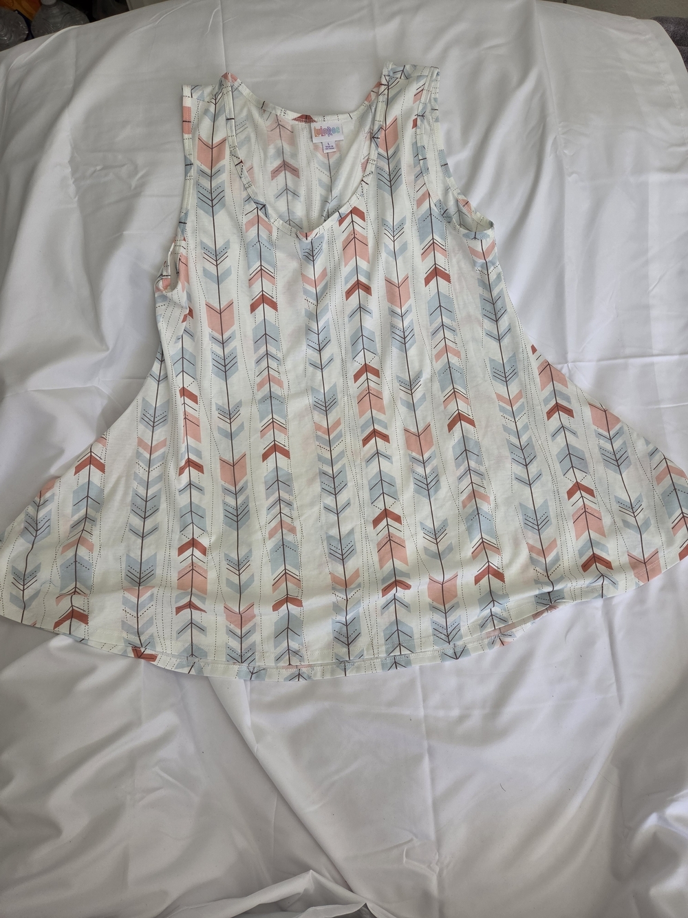 LuLaRoe Sleeveless Arrow-Print Tunic — White with Pink and Light Blue